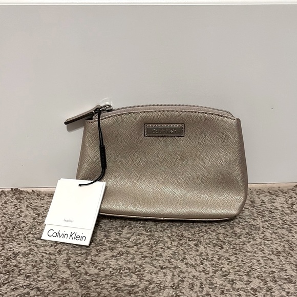 Calvin Klein Handbags - ✨NWT~Calvin Klein Leather Shimmer Cosmetic Bag✨